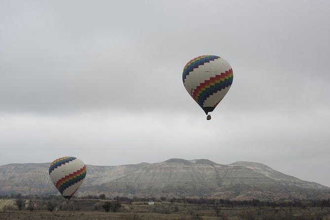Cappadocia Hot Air Balloon Ride with Breakfast and Champagne - Love Valley flyover: balloons, sunlight, and the “low pass” thrill