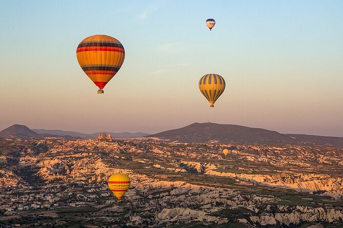 Cappadocia Hot Air Balloon Tour Over Fairychimneys - Launch site routine: balloons inflating and a safety-first approach