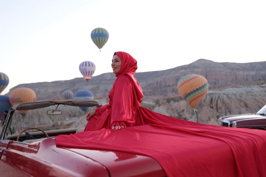 Cappadocia Photo Shoot with Classic Car and Flying Dress - Bouquet and hair and makeup options that keep it photo-ready