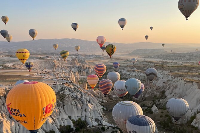Cappadocia Sunrise Hot Air Balloon Flight / Discovery Balloons - The flight itself: altitude, valleys, and 150 balloons in the sky