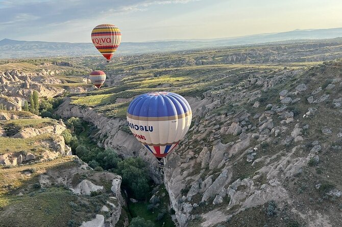 Cappadocia Sunrise Hot Air Balloon Ride | All-Inclusive Tour Cat - Sunrise in Cappadocia, but with a calmer flight zone
