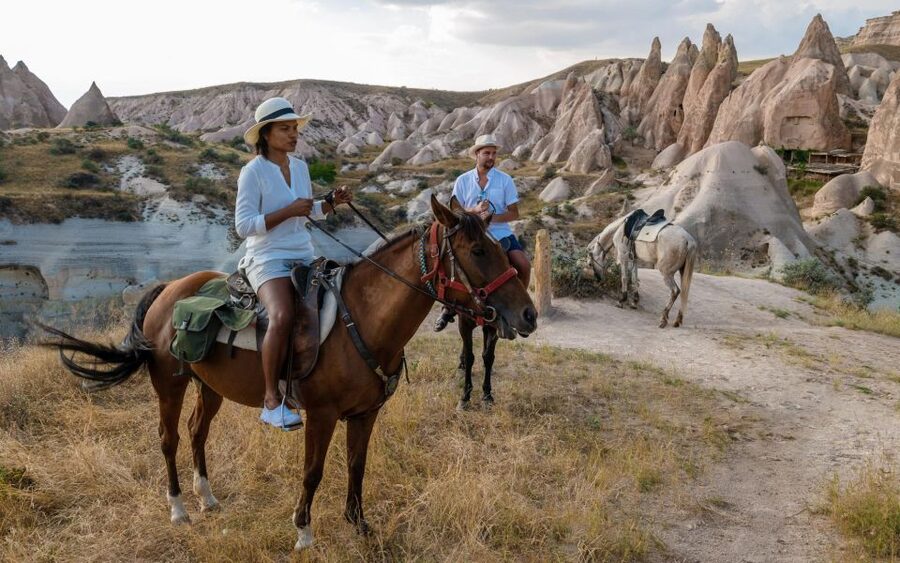 Cappadocia: Sunset Horseback-Riding Tour - Entering Rose Valley: Fairy Chimneys Up Close, Not Just From a Viewpoint