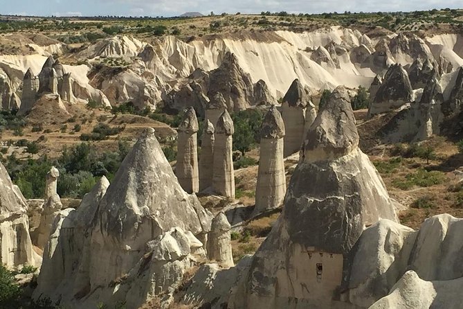 Full-Day Sacred and Surreal Cappadocia Tour from Goreme - Love Valley and the Argeus view: red, rose, and columns