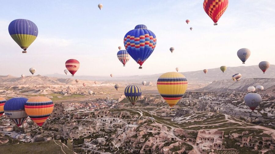 Goreme: Sunrise Hot Air Balloon Flight over Cappadocia - The Sunrise Flight: Fairy Chimneys, Valleys, and Hundreds of Balloons