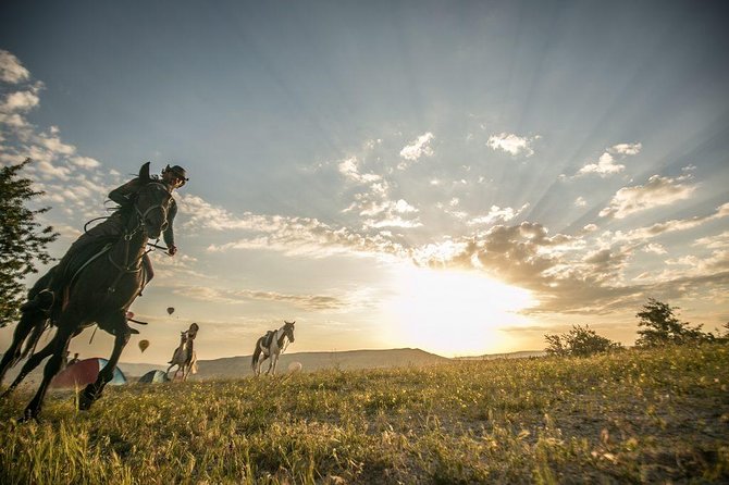 Horse Riding in Cappadocia in fairy chimeys - Rose Valley at Pink-Rock Sunset and Fairy Chimney Time